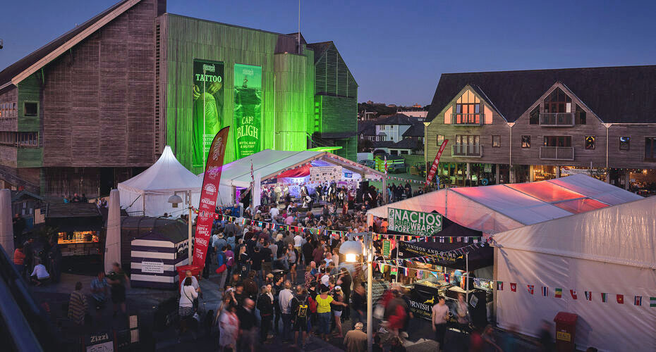 A festival with market stalls at Falmouth harbour