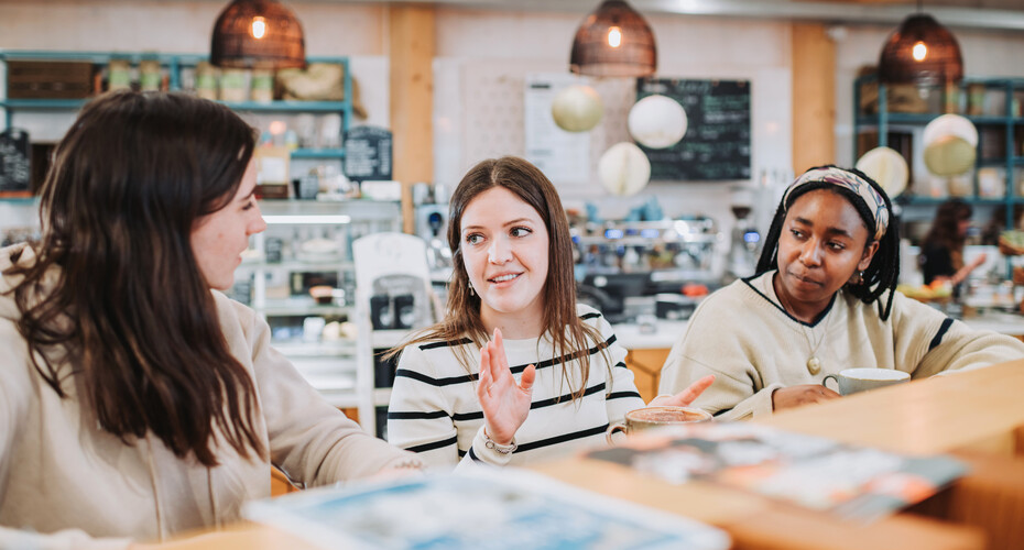 Friends getting lunch in the Exchange, Penryn Campus