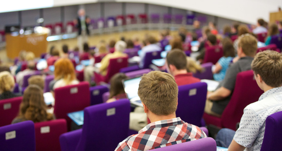 A lecture taking place in the Alumni Auditorium, Streatham Campus, Exeter