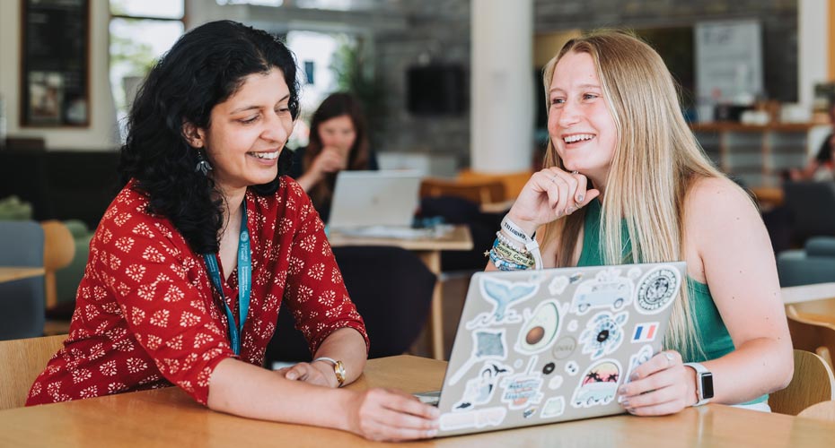 A student talking to her tutor