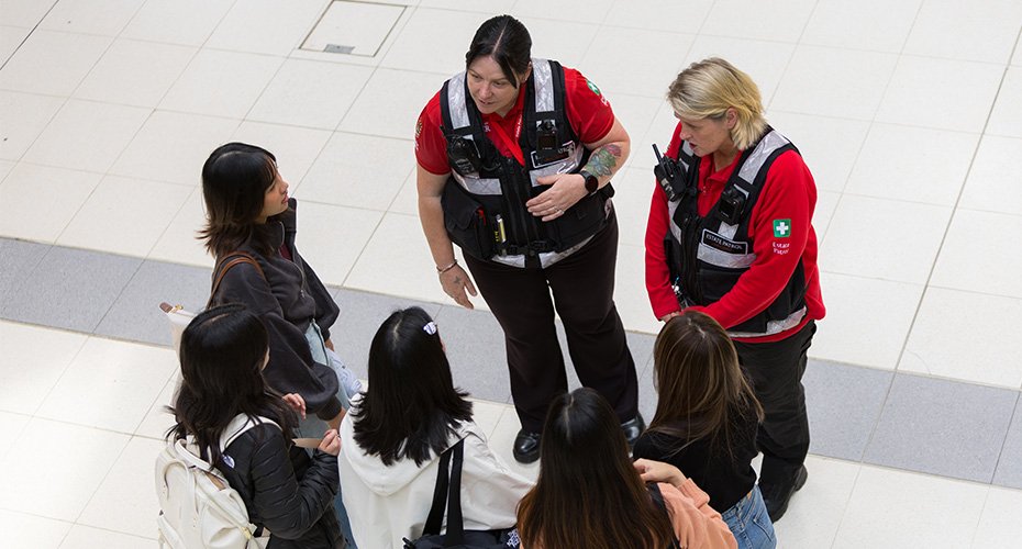 Estate Patrol Team talking with students