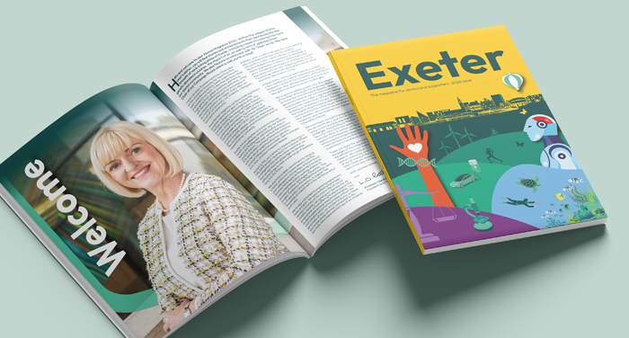 An open alumni magazine with the cover and inner pages displayed