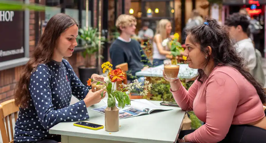 Students enjoying a coffee in Exeter