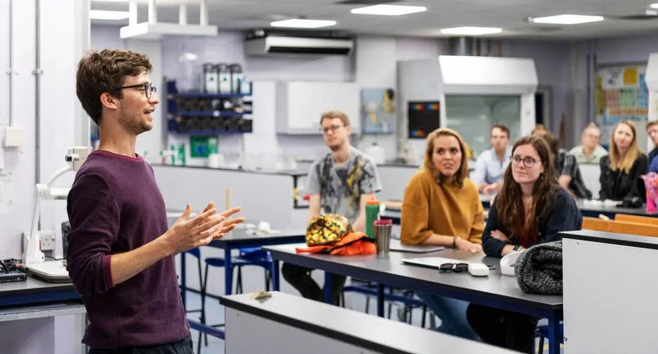 A PGCE student presenting to his fellow course mates