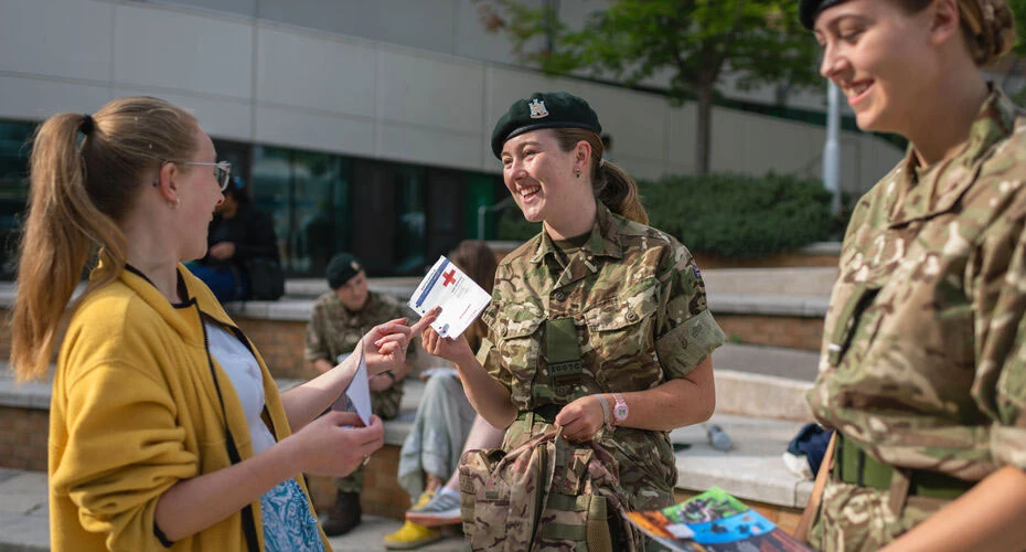 The Exeter University Officers' Training Corps handing out flyers on campus