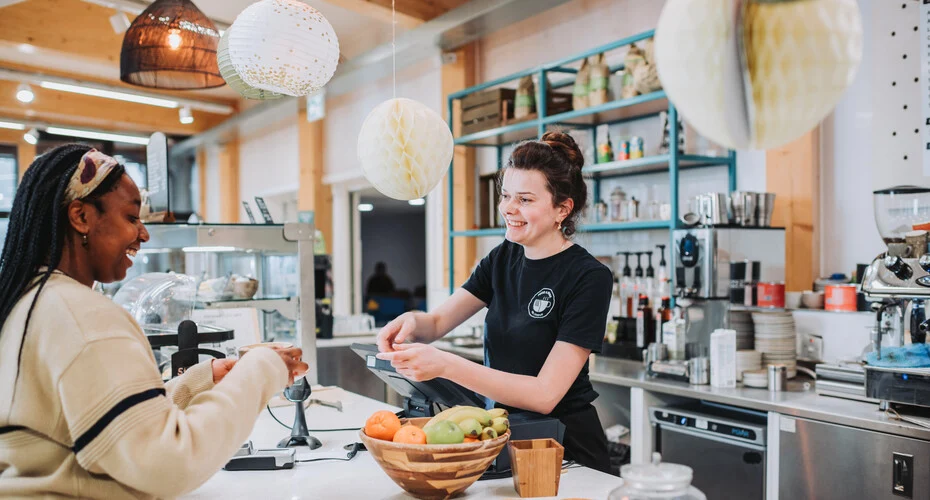 A student buying a coffee
