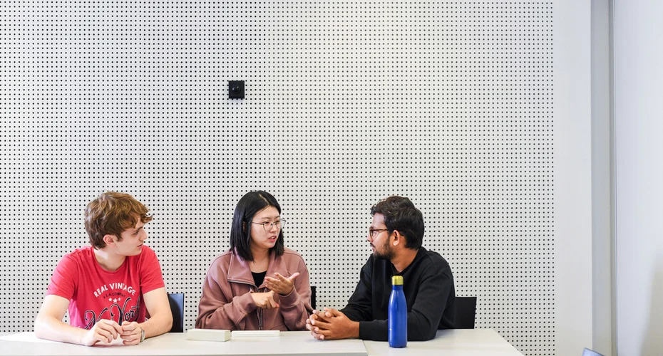 Mathematics students studying in a teaching and study space on Streatham Campus.