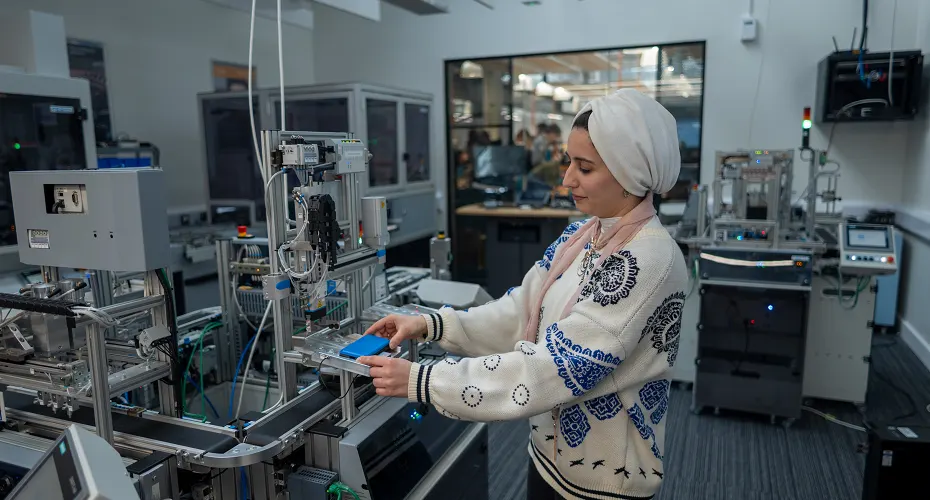 An Engineering student working in an on-campus lab.