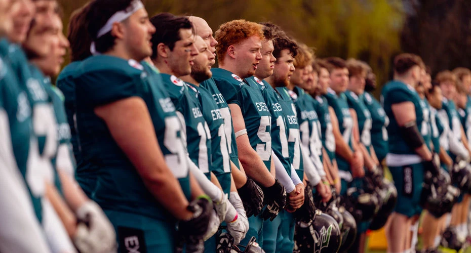 The American Football team lining up