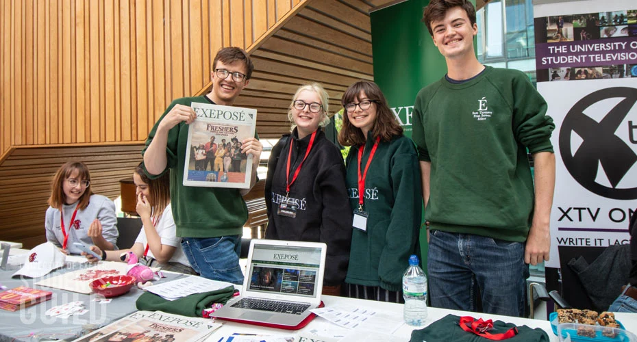 Exepose, student newspaper, representatives at a societies fair