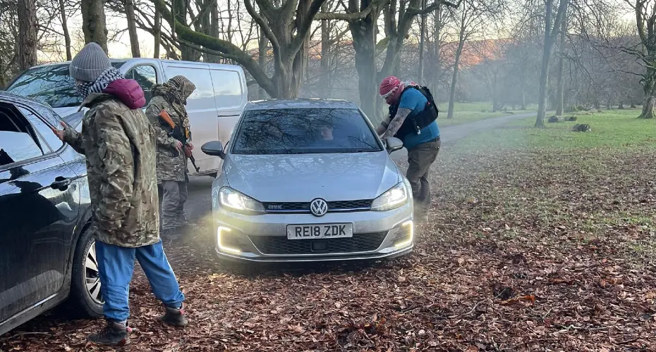Training drill for car jacking with Extreme Medicine students in a woodland environment